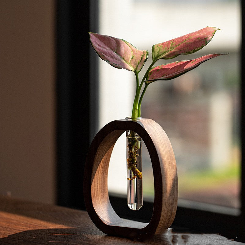 Elegant handcrafted solid wood flower holder for modern home decor.