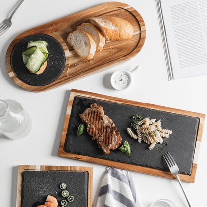 Artisan crafted natural wood charcuterie tray with cheese and fruits.