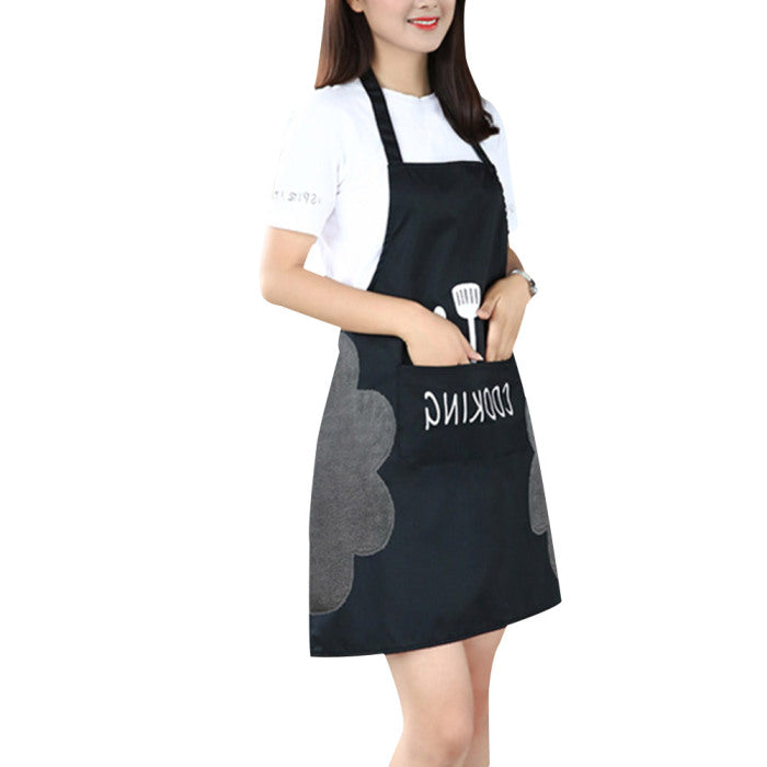 Close-up of the waterproof fabric and coral velvet on the sleeveless apron.