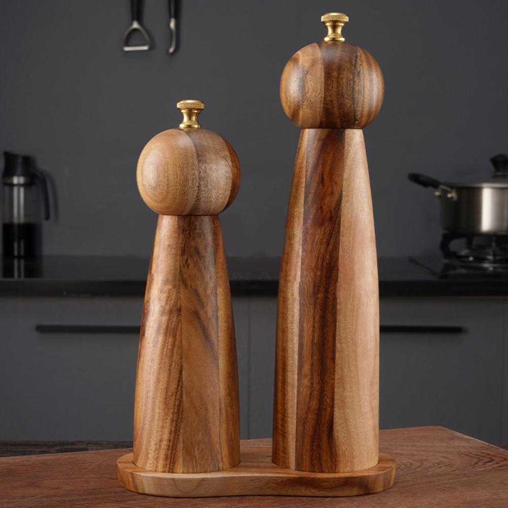 Close-up of the adjustable ceramic grinding mechanism on the wood pepper mill.