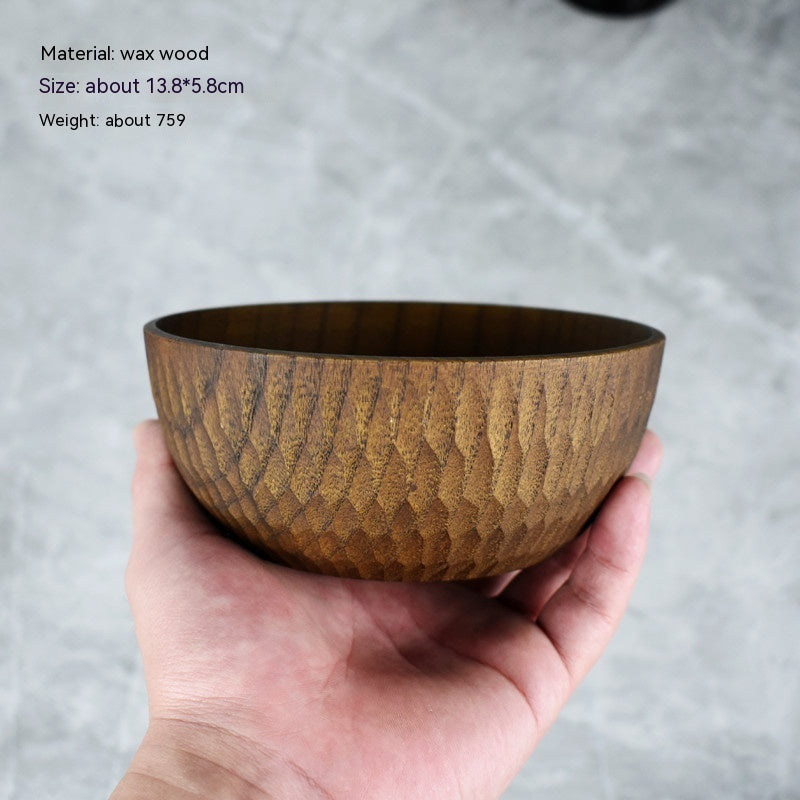 Small rustic wooden snack bowl displayed on a charcuterie board.