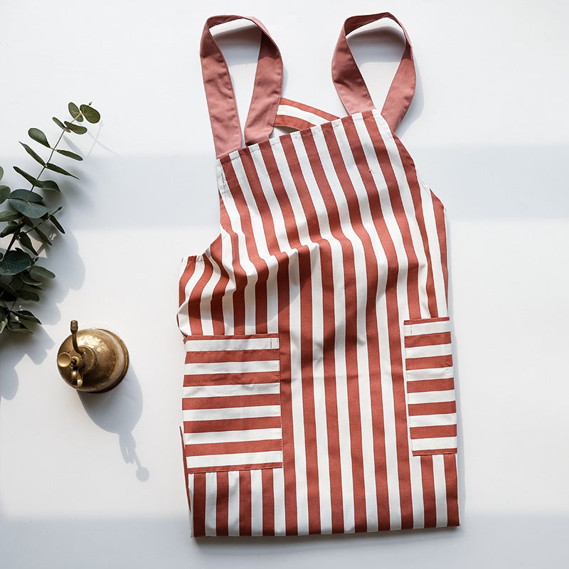 Close-up of the breathable worsted cotton fabric on the kitchen apron.