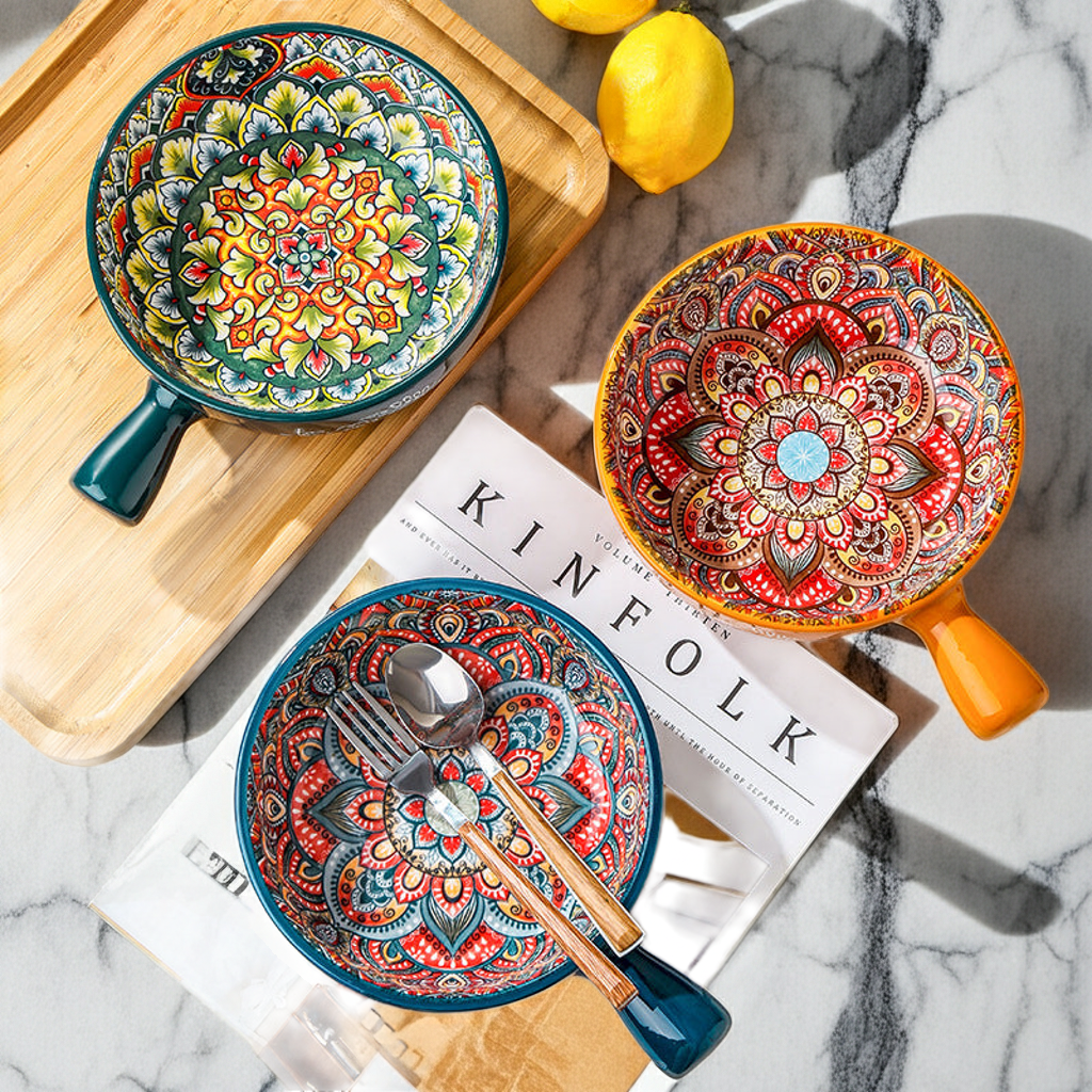 Close-up of the unique flower-shaped handle on the ceramic salad bowl.