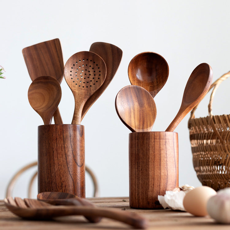 Close-up of the long comfortable handles on the wooden kitchen tools.