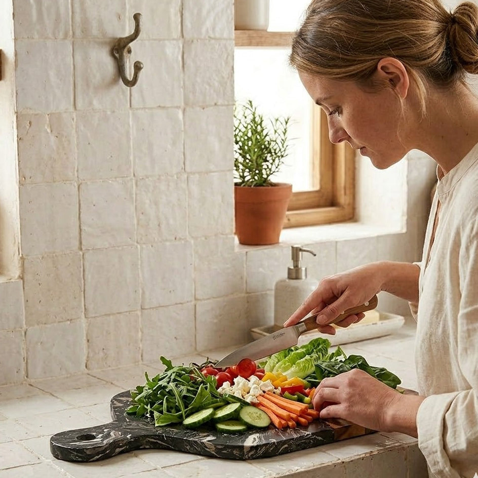 Luxury irregular shaped marble and acacia wood charcuterie serving board.