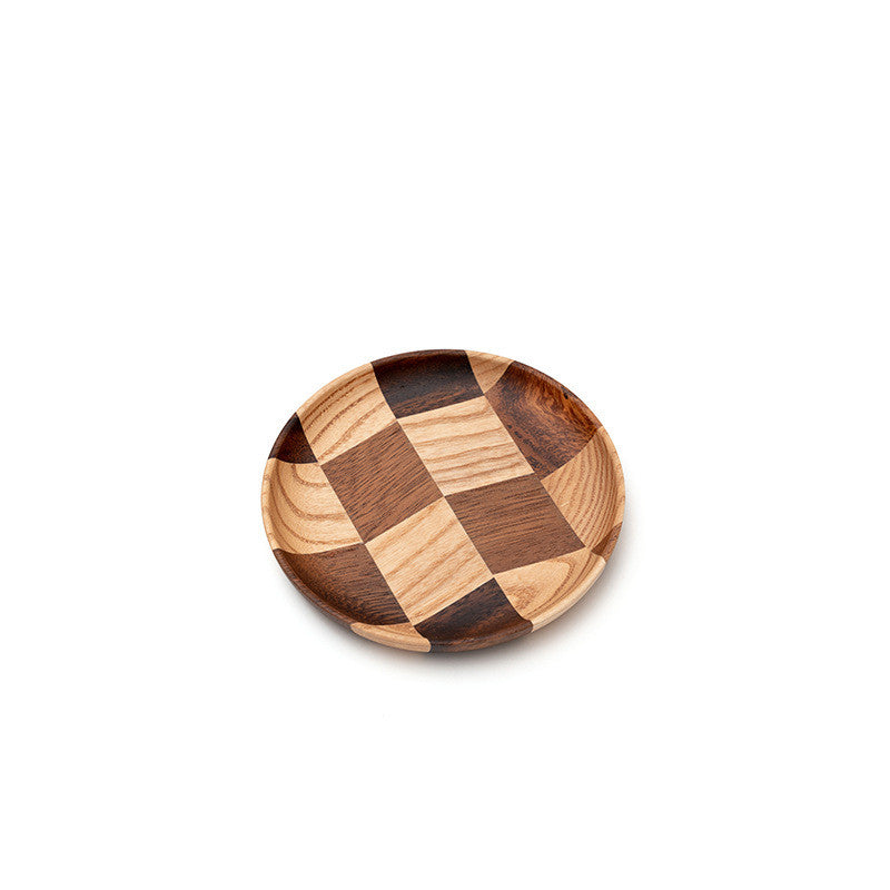 Minimalist natural wooden cake board with a smooth polished finish.